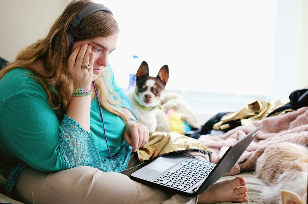 student learning on laptop